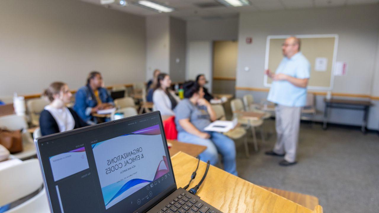 professor teaching a course